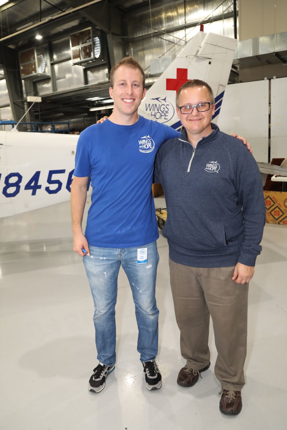 Adam Kruger, President of Young Friends, Bret Heinrich, President and CEO